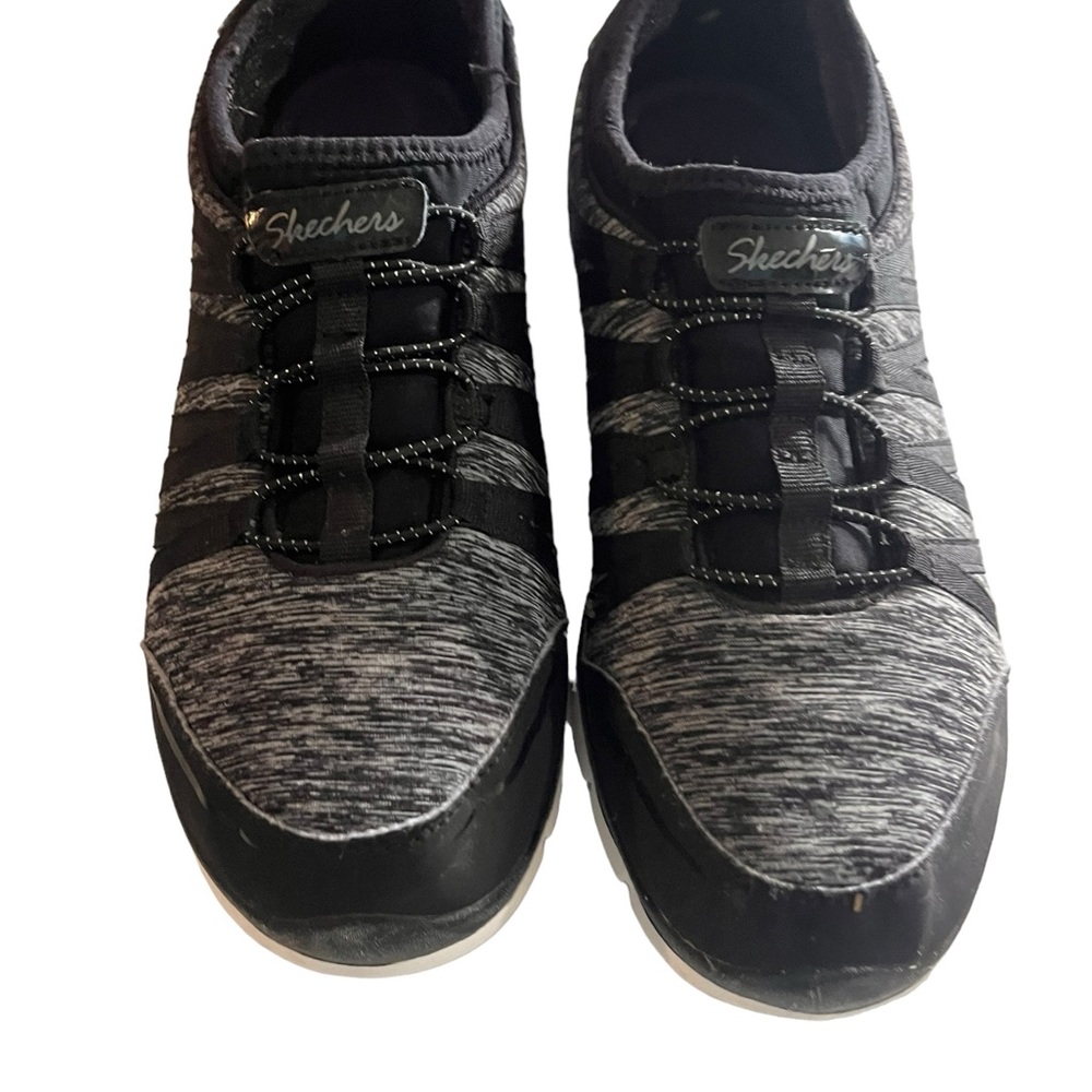 size 9 Sketchers athletic shoes